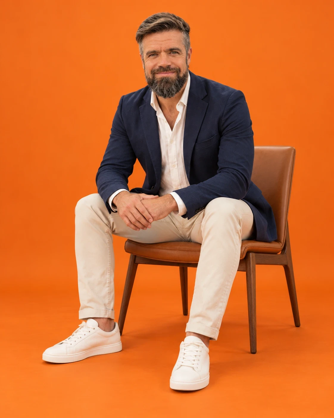 Chris Murray, seated, smiling